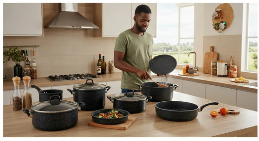 A modern Kenyan kitchen showcasing a set of granite cookware on the stovetop.